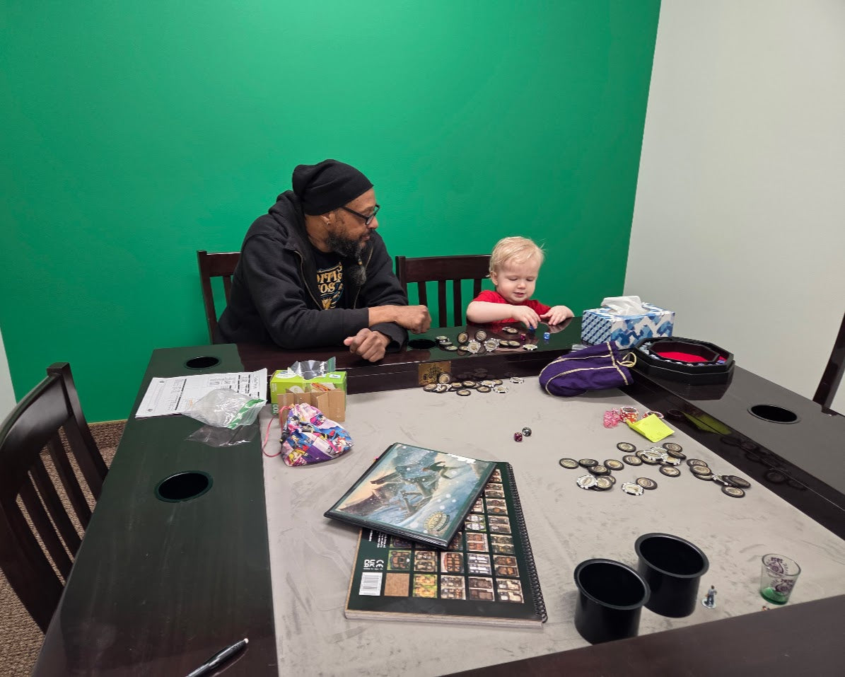 Artemis and Chris Playing at a Gaming Table - Carolina Game Tables