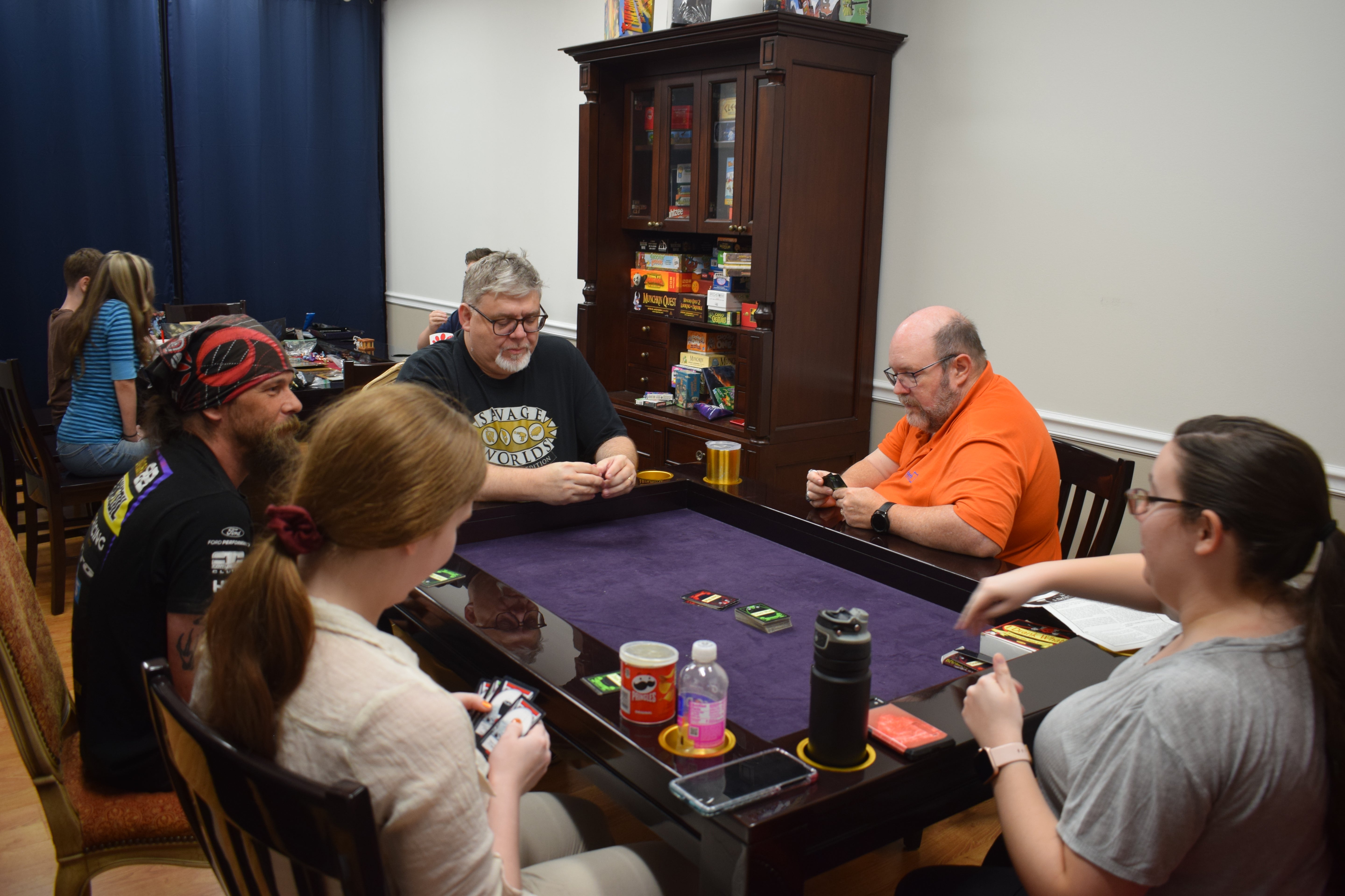 Playing Cards at a Dining Table - Carolina Game Tables